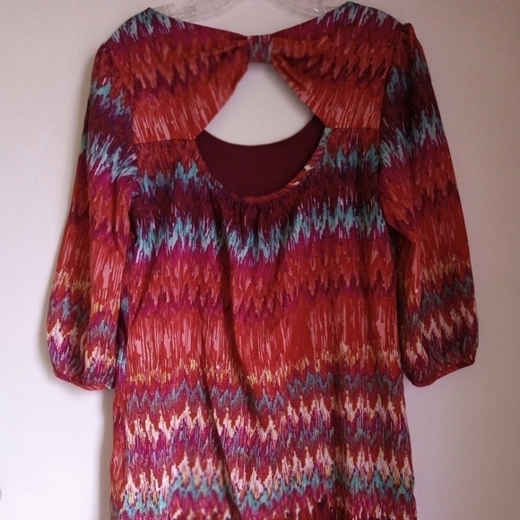 Lily Rose a-line mini dress with 3/4 length puff sleeves and back cutout - Picture 3 of 7